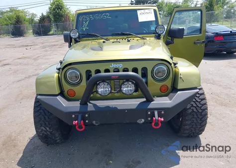 2007 Jeep Wrangler Unlimited Sahara from USA, damaged, VIN 1J4GA59117L118162